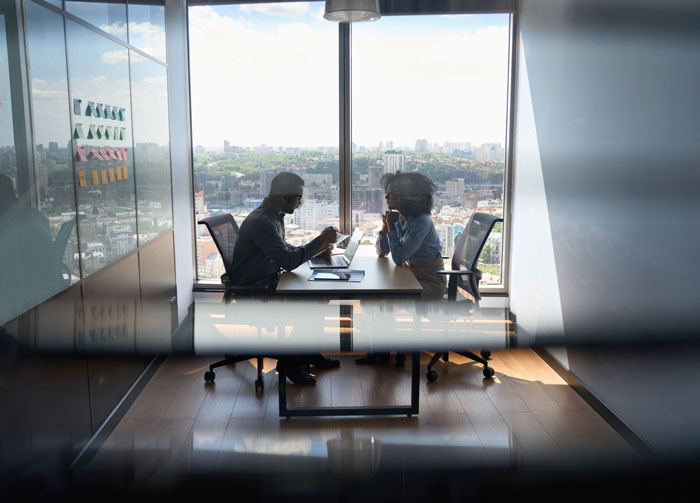 lawyers-having-a-meeting-in-a-glass-office